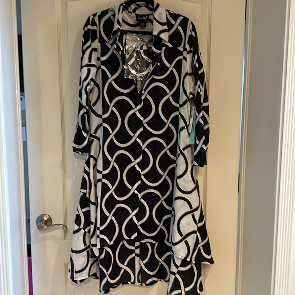 Black and white asymmetrical dress shorter in the front in the back